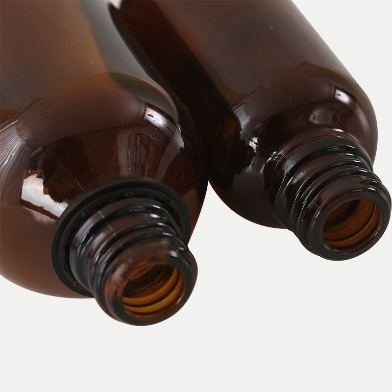Amber glass essential oil bottle